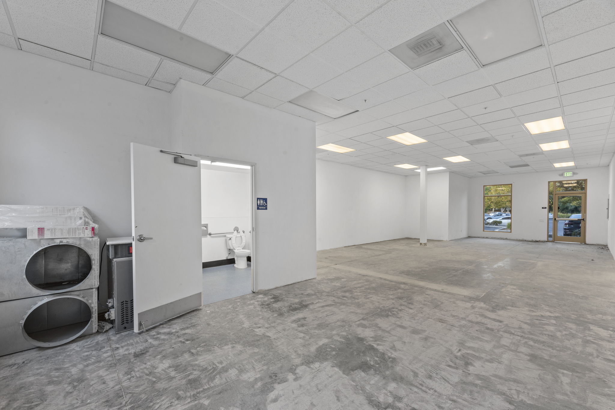 1,200 SF retail shell — bathroom and ductwork detail