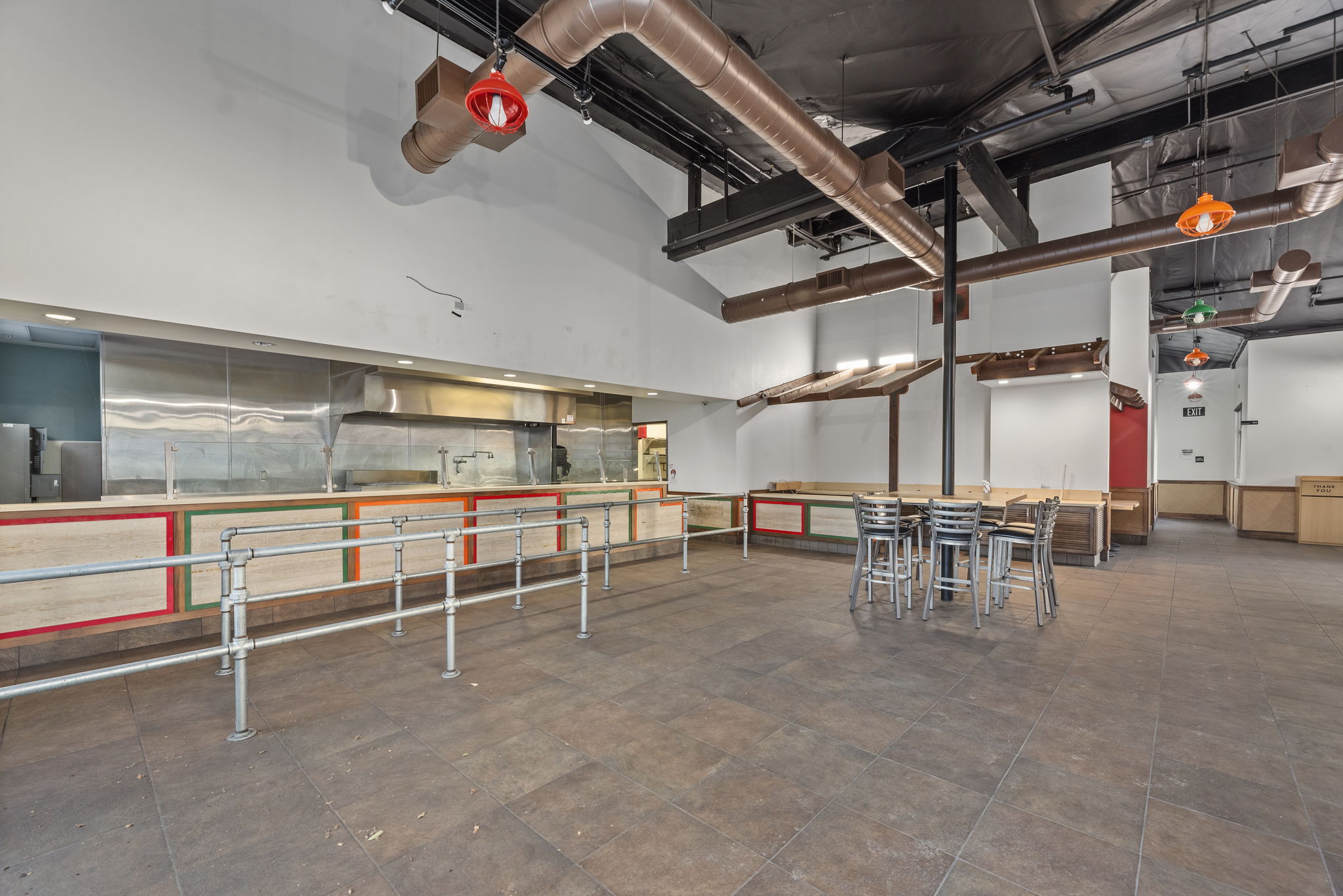 2,825 SF restaurant — full kitchen with stainless hood and prep line